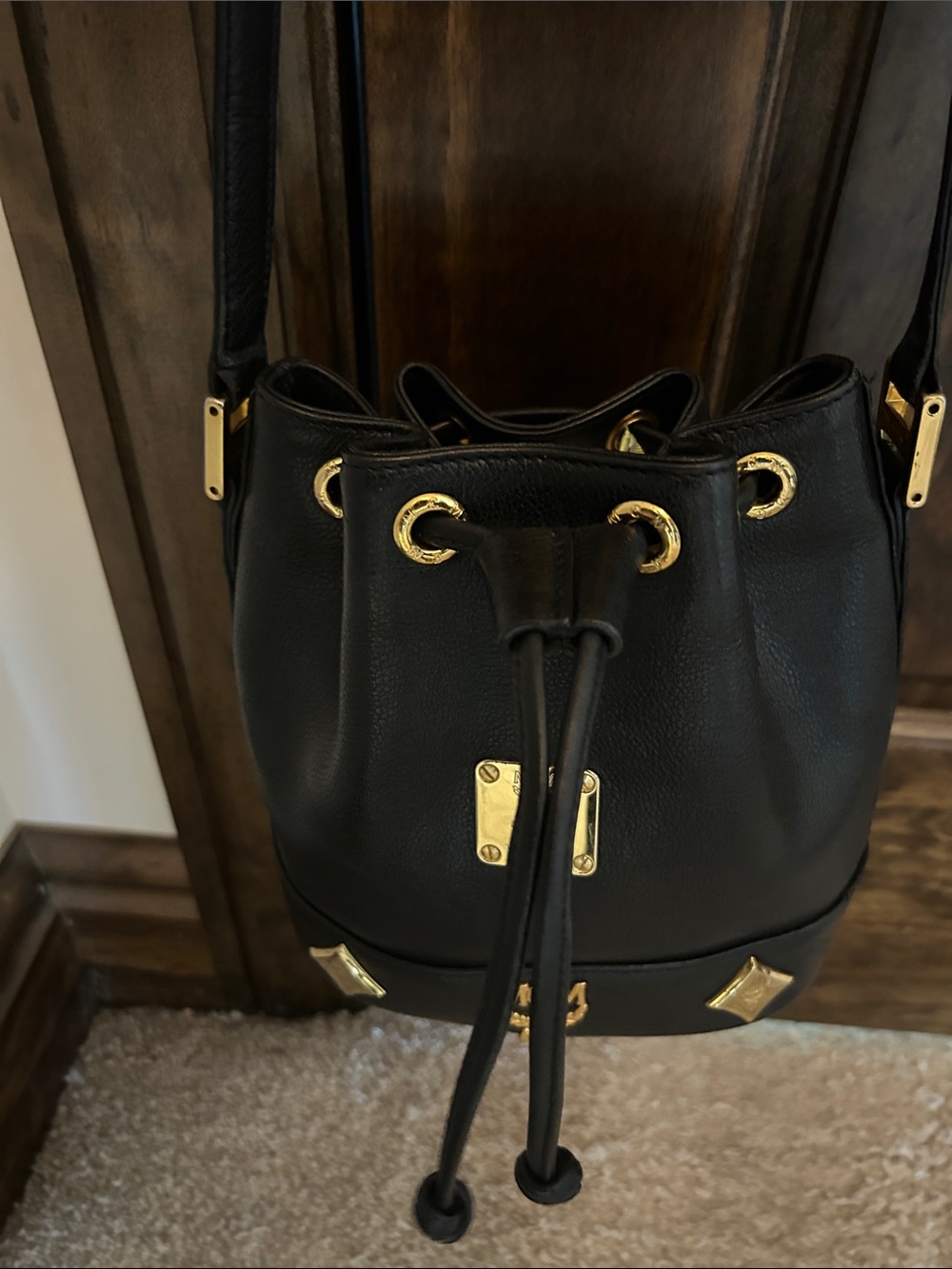 MCM Black Leather Mini Drawstring Bucket Bag with Gold Accents - Picture 4 of 14